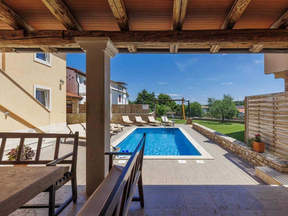 Vakantiehuis met privézwembad en zwembad in Štinjan, Kroatië voor 16 personen foto 24