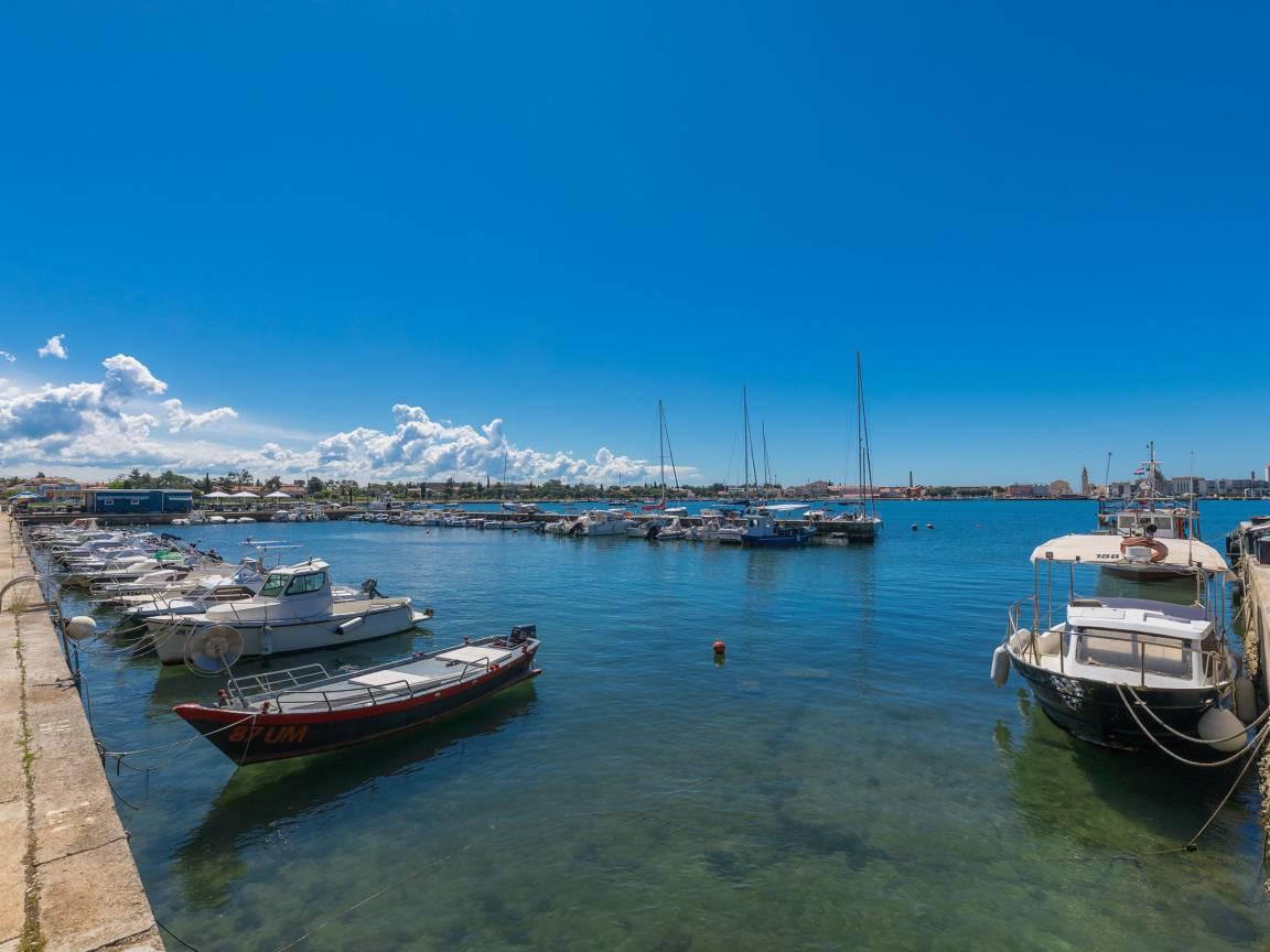Vakantiehuis met zeezicht en ligging bij zee en 2 slaapkamers en hond toegestaan in Umag, Kroatië voor 4 personen foto 25