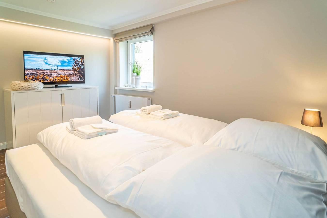 Vakantieappartement met 70 m², 2 slaapkamers en terras in Wenningstedt, Sylt, Duitsland voor 4 personen foto 21