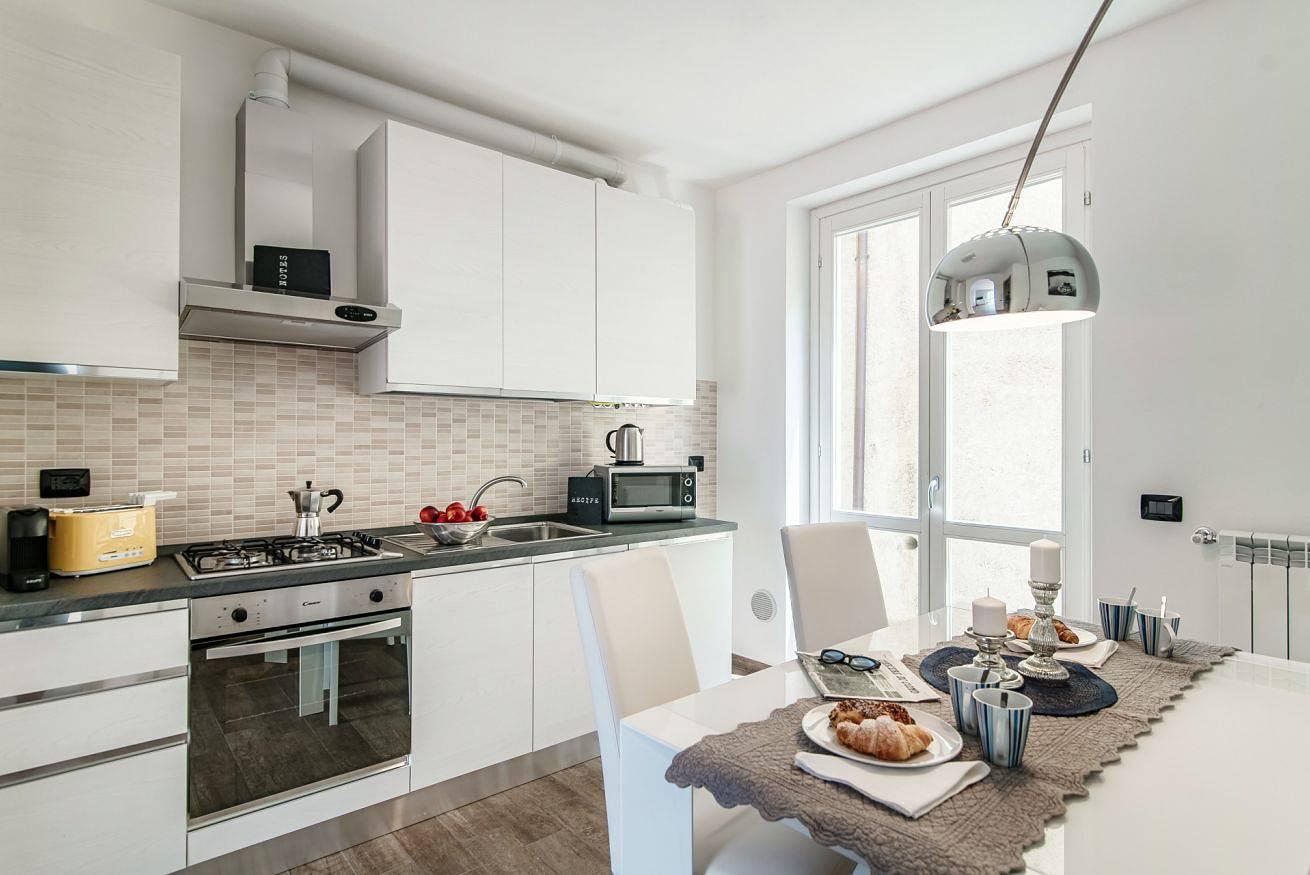 Vakantieappartement met uitzicht op het meer in Comomeer, Italië voor 4 personen foto 20