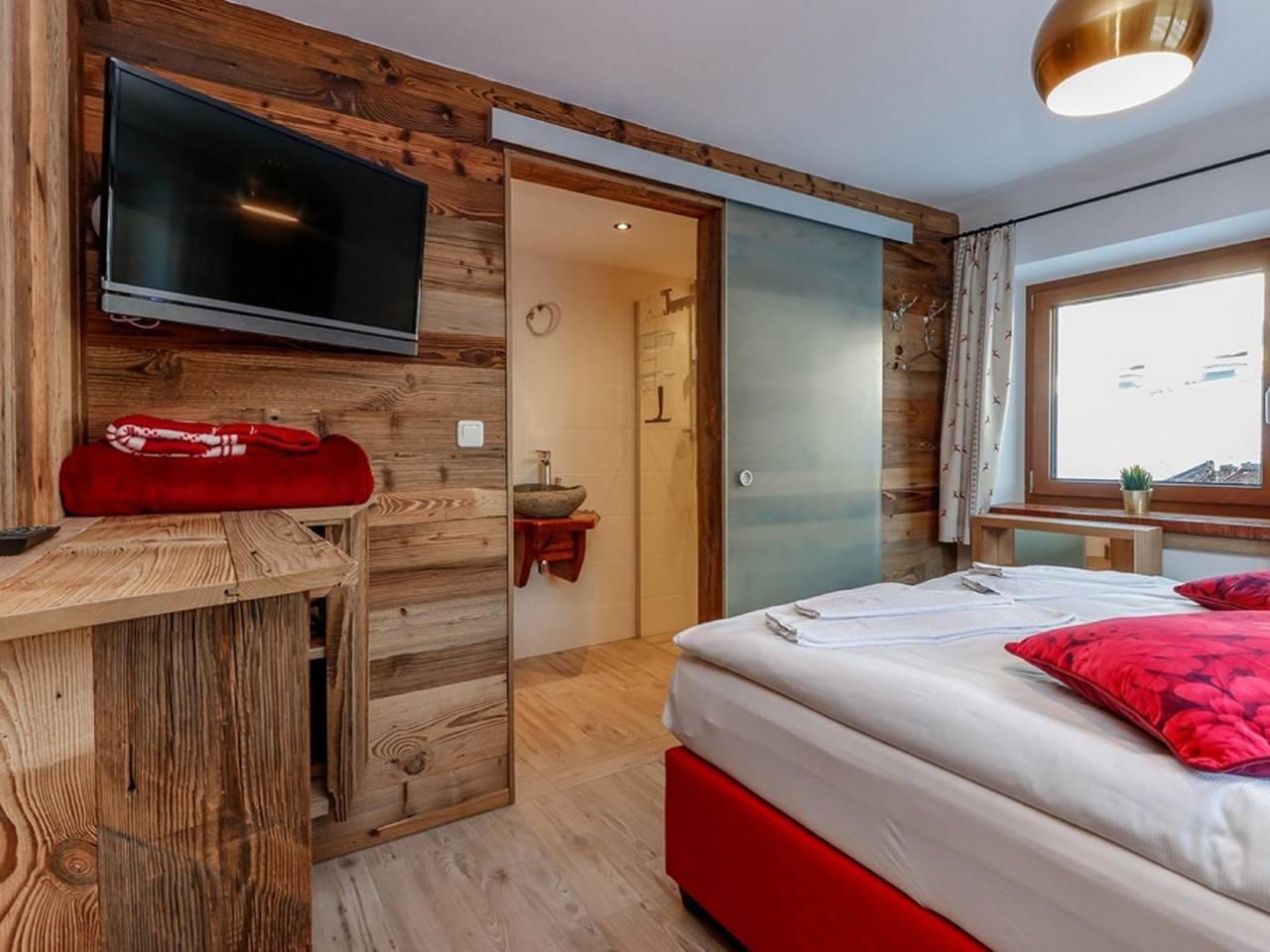 Vrijstaand ski-in/ski-out groepshuis met balkon in Rauris, Oostenrijk voor 21 personen foto 19