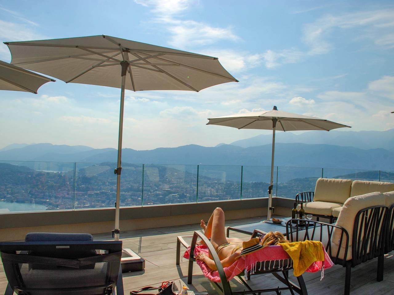 Vakantieappartement met zwembad en 2 slaapkamers en terras in Lugano, Luganomeer, Zwitserland voor 4 personen foto 21