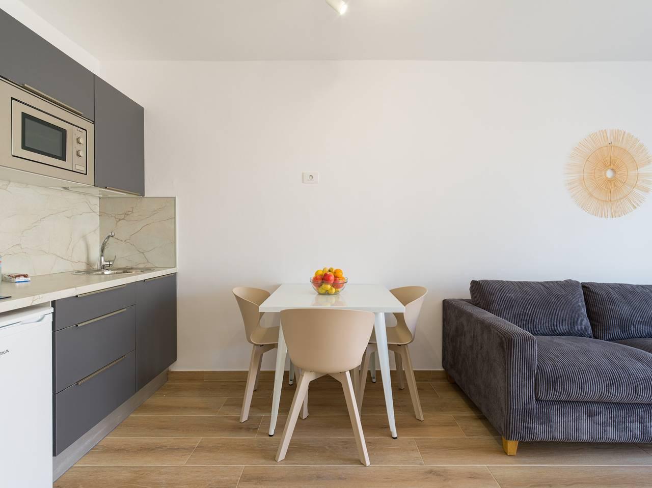 Vakantieappartement met zwembad en airconditioning in Corralejo, La Oliva, Spanje voor 3 personen foto 21