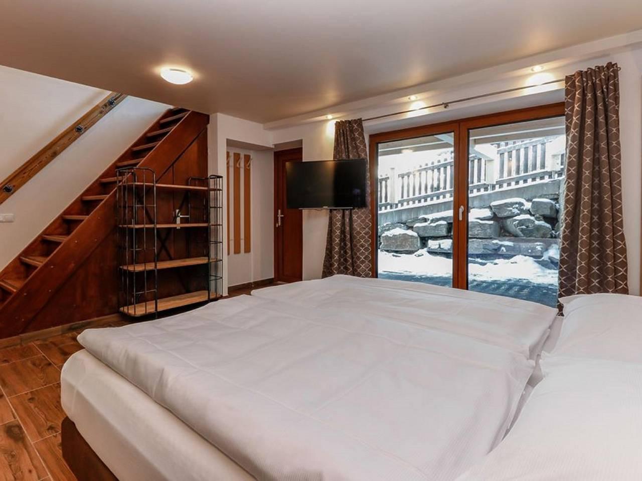 Vrijstaand ski-in/ski-out groepshuis met balkon in Rauris, Oostenrijk voor 21 personen foto 23