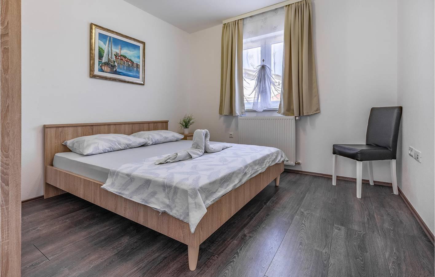 Stijlvol appartement met 2 slaapkamers, zwembad, terras en wifi in Pula-Medulin, Pula, Kroatië voor 6 personen foto 22