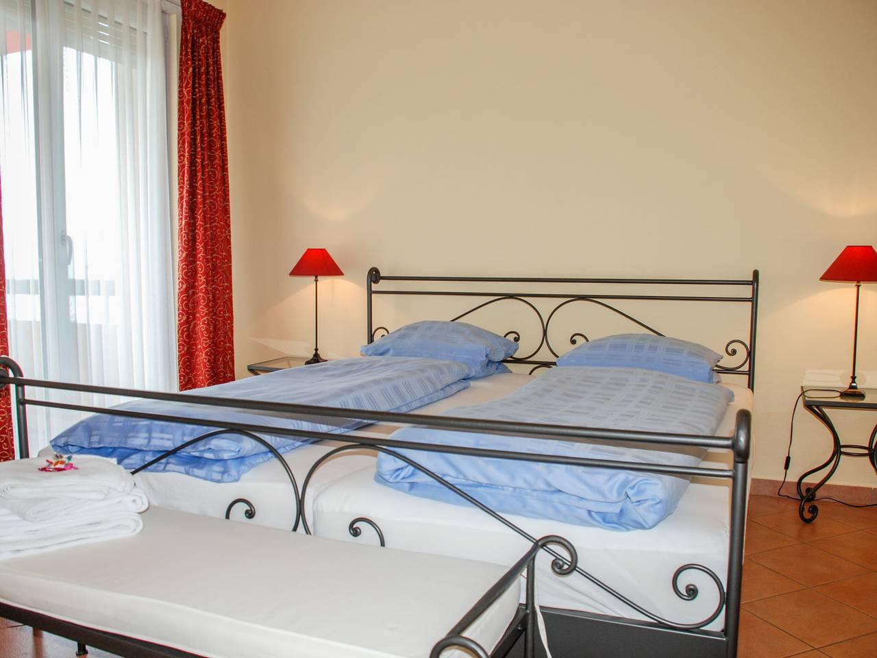 Vakantieappartement met zwembad en 2 slaapkamers en terras in Lugano, Luganomeer, Zwitserland voor 4 personen foto 4
